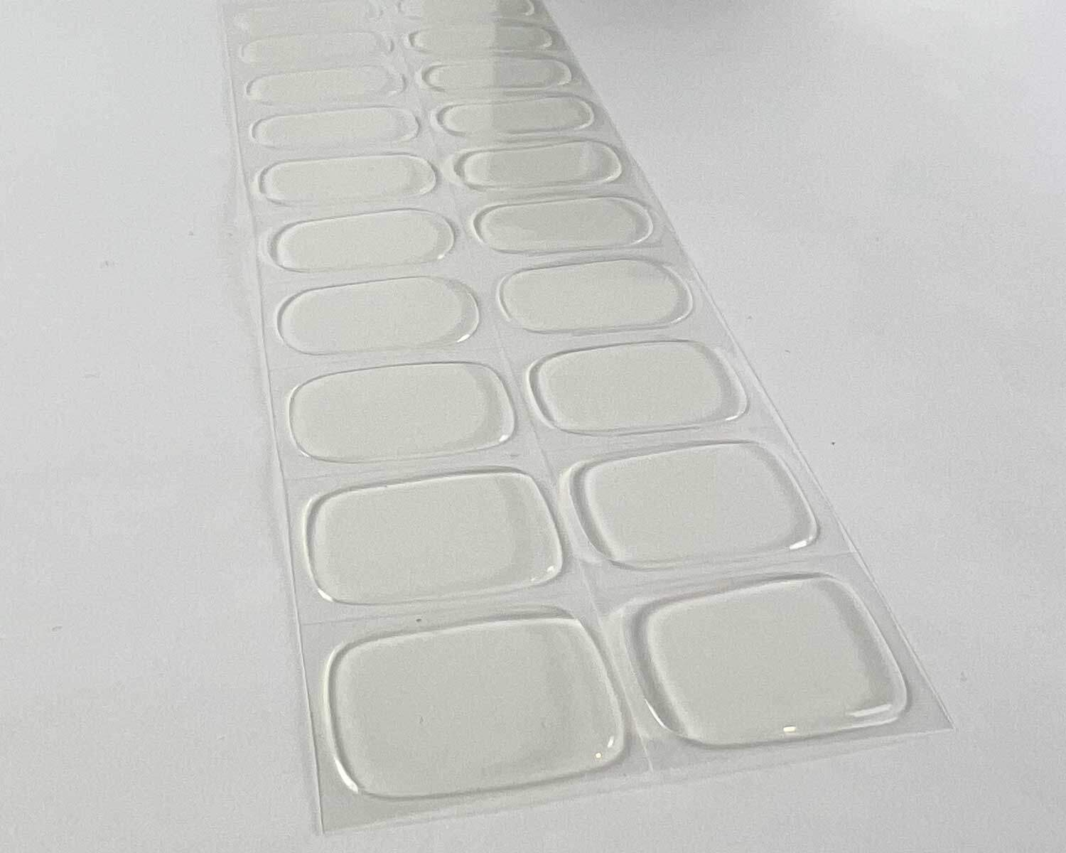 Transparent clear semi-cured gel nails on angle zoomed in on white background