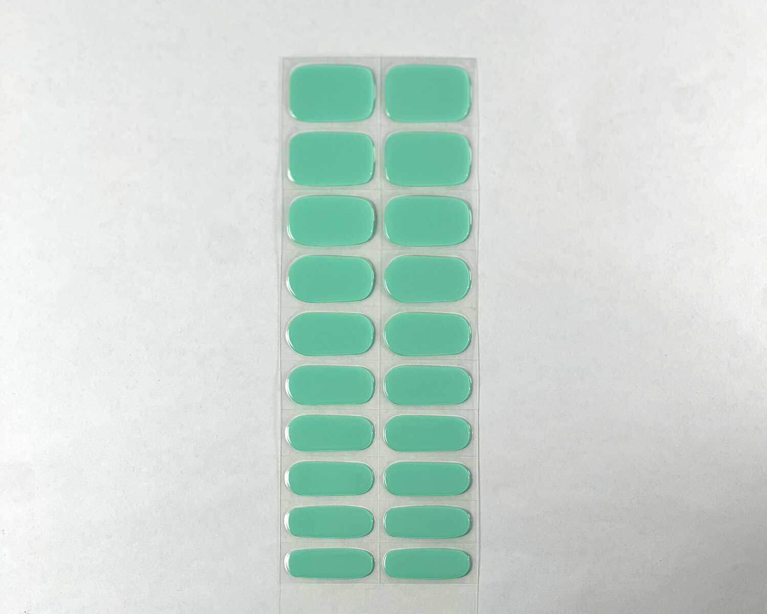 Aqua semi-cured gel nails strip showing 20 pieces with 10 different sizes on white background