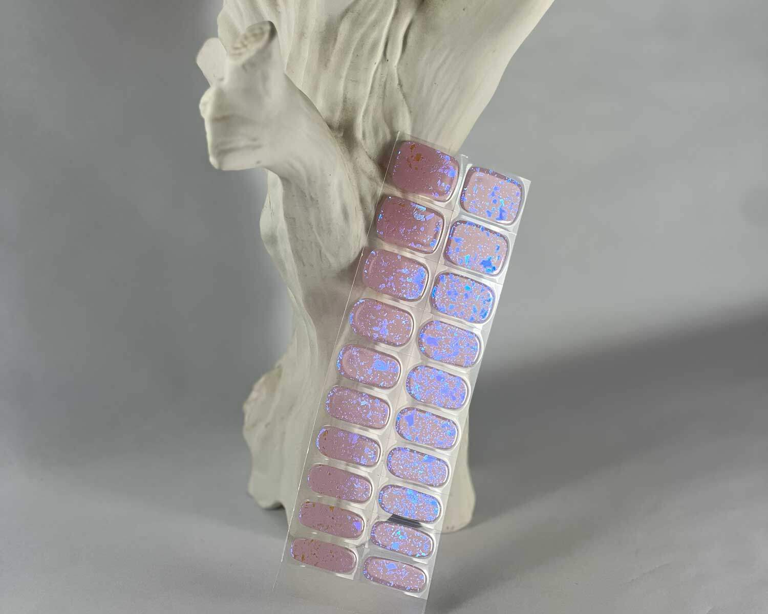 pink-speckle-semi-cured-gel-nail-tree Pink Speckle Orange semi-cured gel nails in mockup to show product against white textured tree