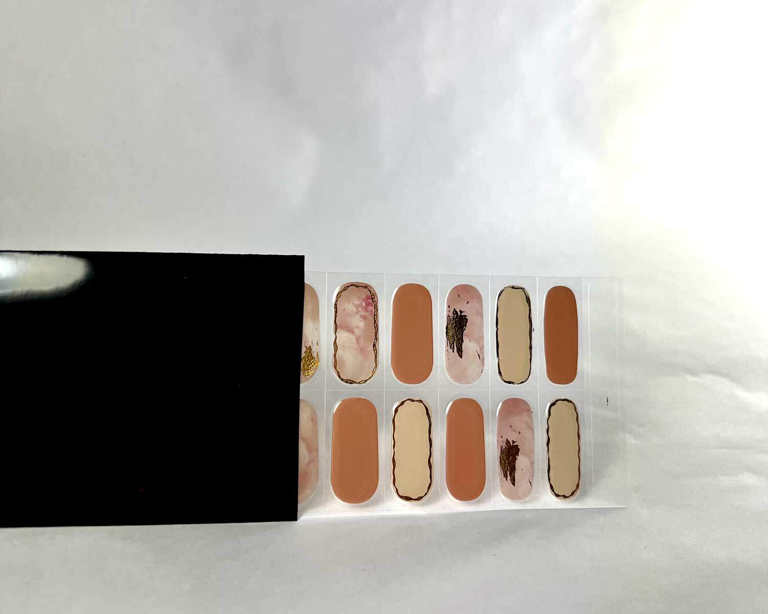 Gold Digger semi-cured gel nails in black light sensitive strip