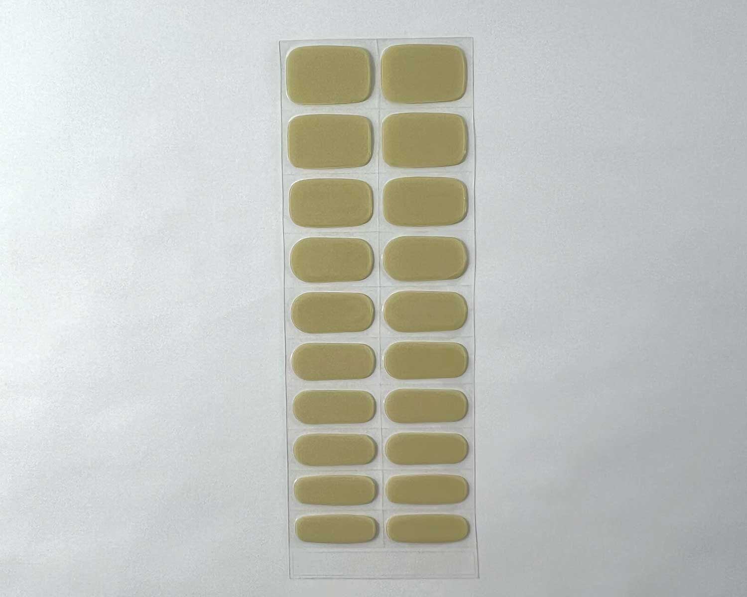 artichoke green semi cured gel nails strip showing 20 pieces with 10 different sizes on white background