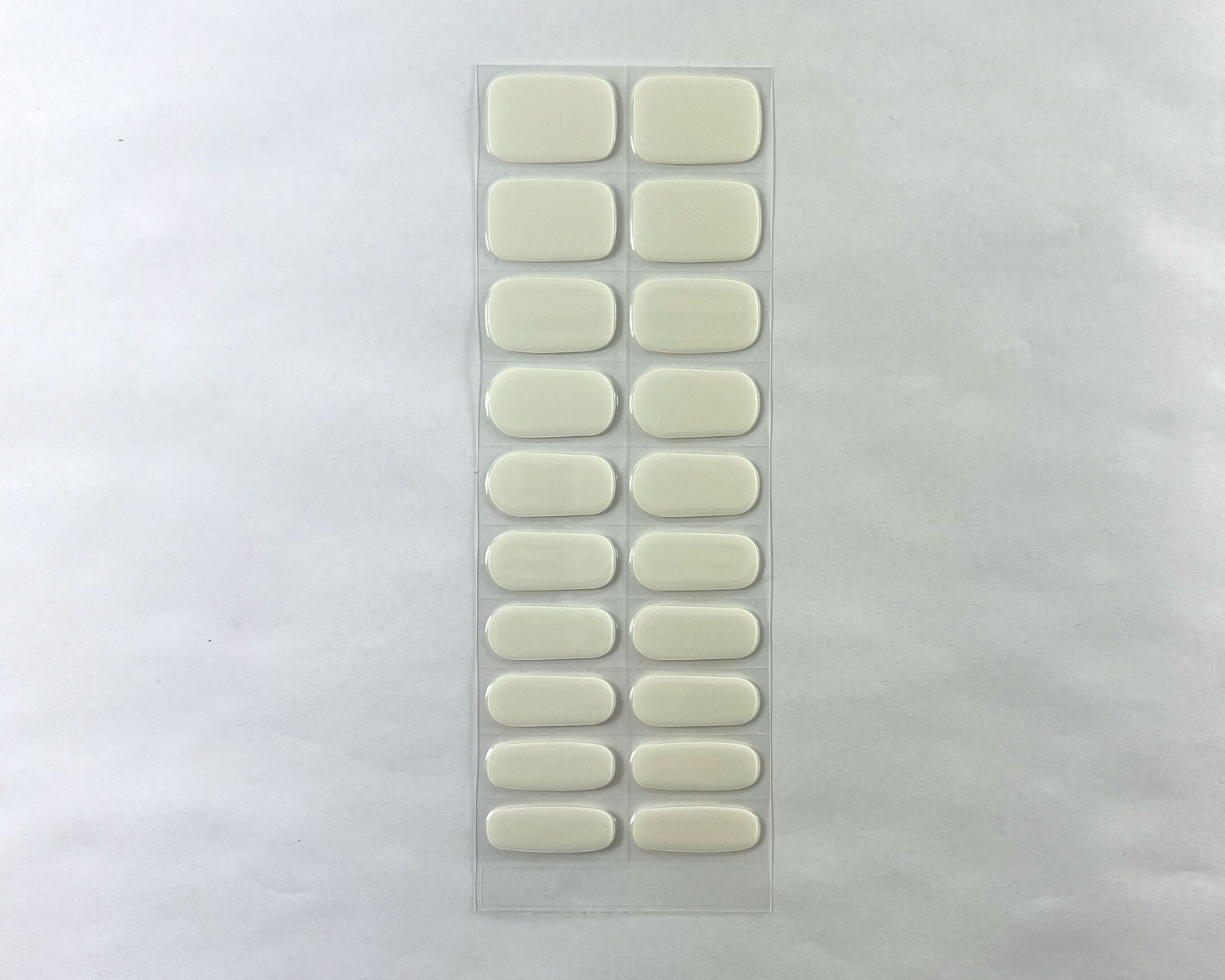 semi-cured-Gel-Nail-Sticker-storm-strip storm white grey semi cured gel nails strip showing 20 pieces with 10 different sizes on white background