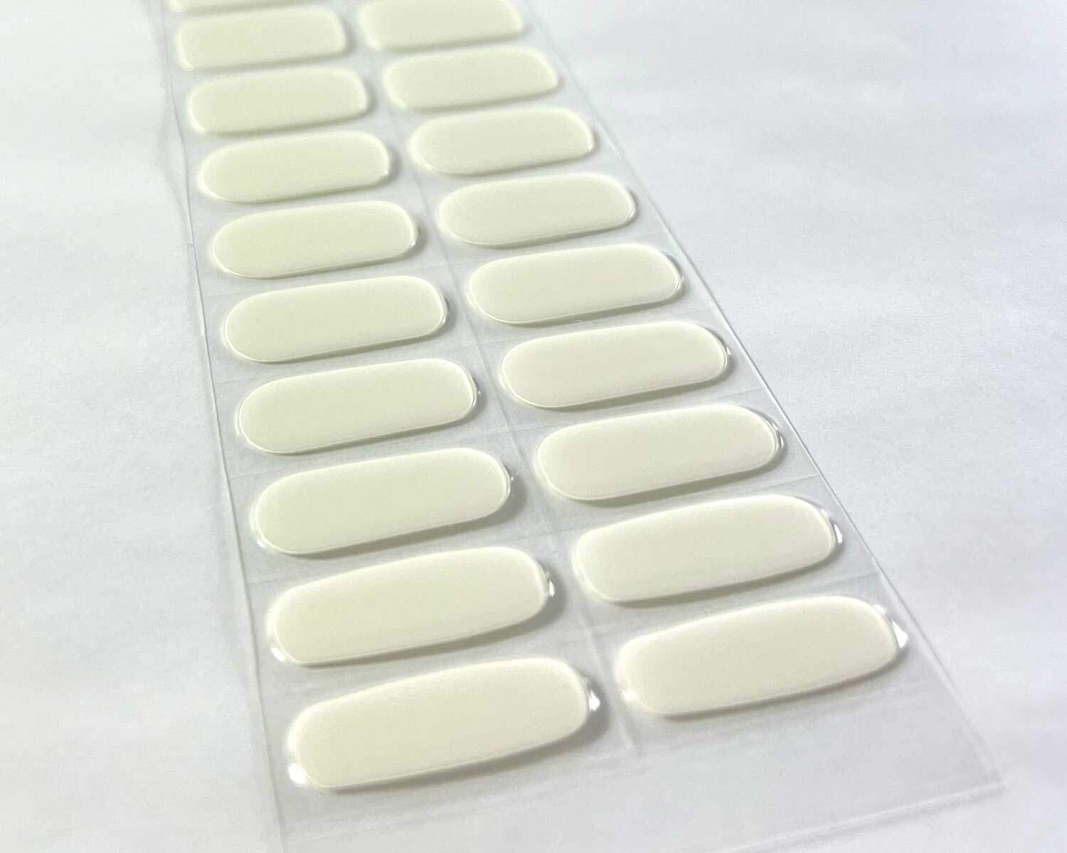 semi-cured-Gel-Nail-Sticker-storm-zoom storm white grey semi-cured gel nails on angle zoomed in on white background