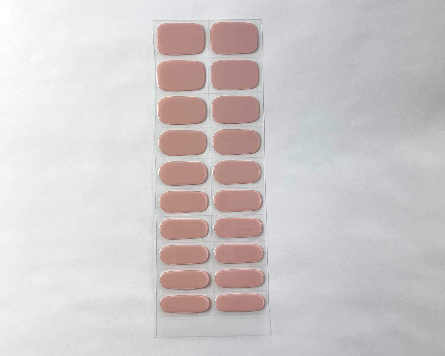 pink marshmallow semi-cured gel nails strip showing 20 pieces with 10 different sizes on white background